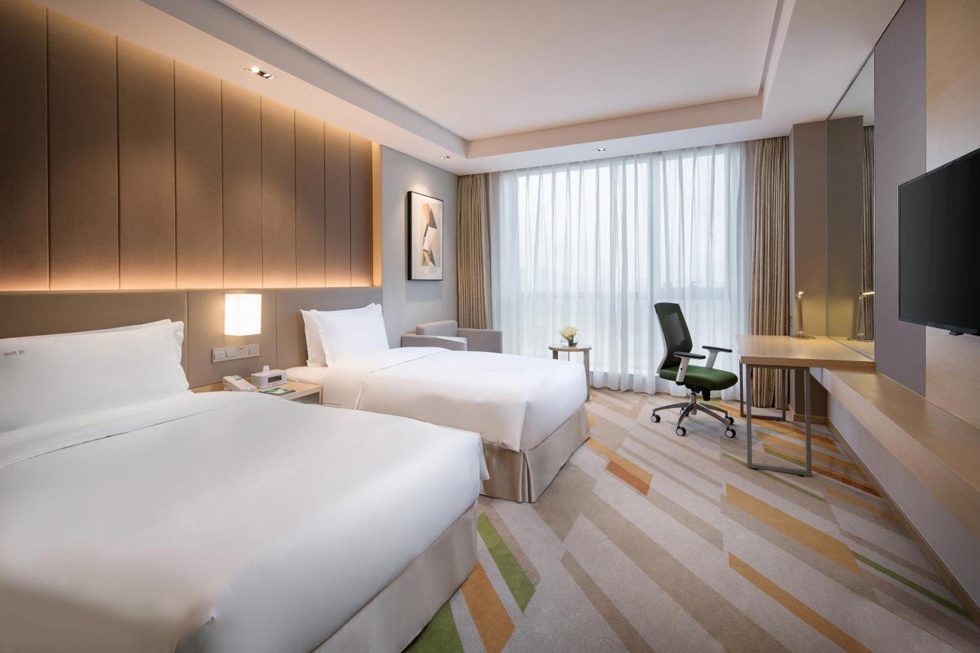 Holiday Inn Wuxi Taihu New City By Ihg Exterior foto